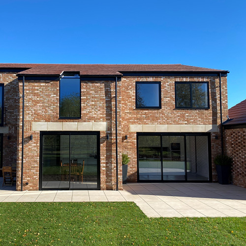Rear exterior of a house built using Kempton Rustica bricks