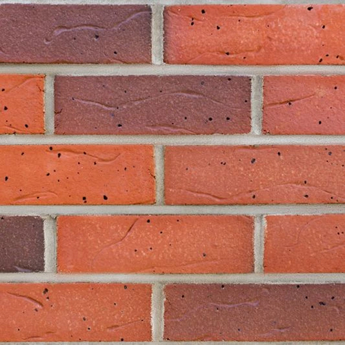 Close up of a wall of Cromer Red Multi bricks