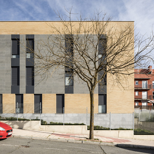 An exterior of a property built using Yellow Smooth bricks