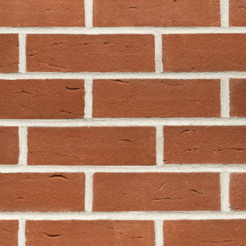 Close up of a wall of Swayfield Red bricks
