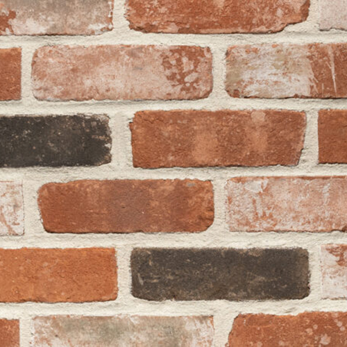 Close up of a wall of Multi Red Rustica bricks