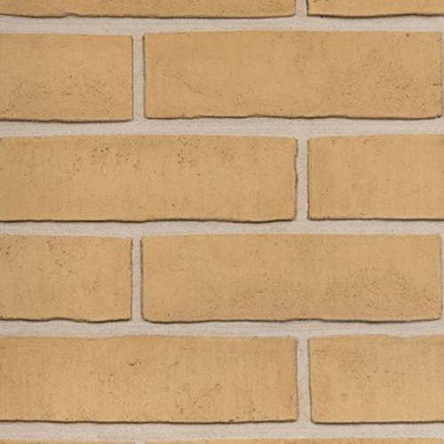 Close up of a wall of Traditional Buff Waterstruck bricks