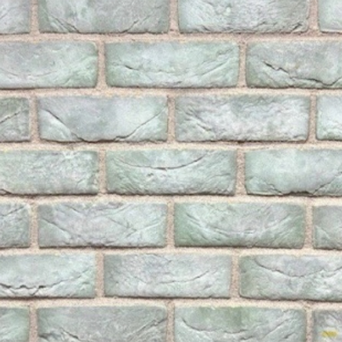 Close up of a wall of Olive Green bricks