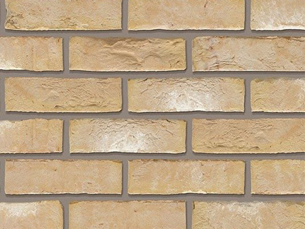 Close up of a wall of Olde Alton Yellow Multi bricks