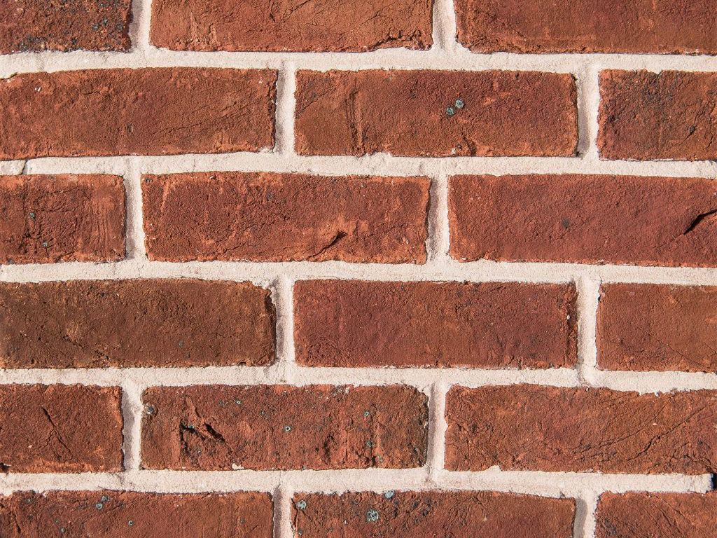 Close up of a wall of Dark Multi Handmade bricks