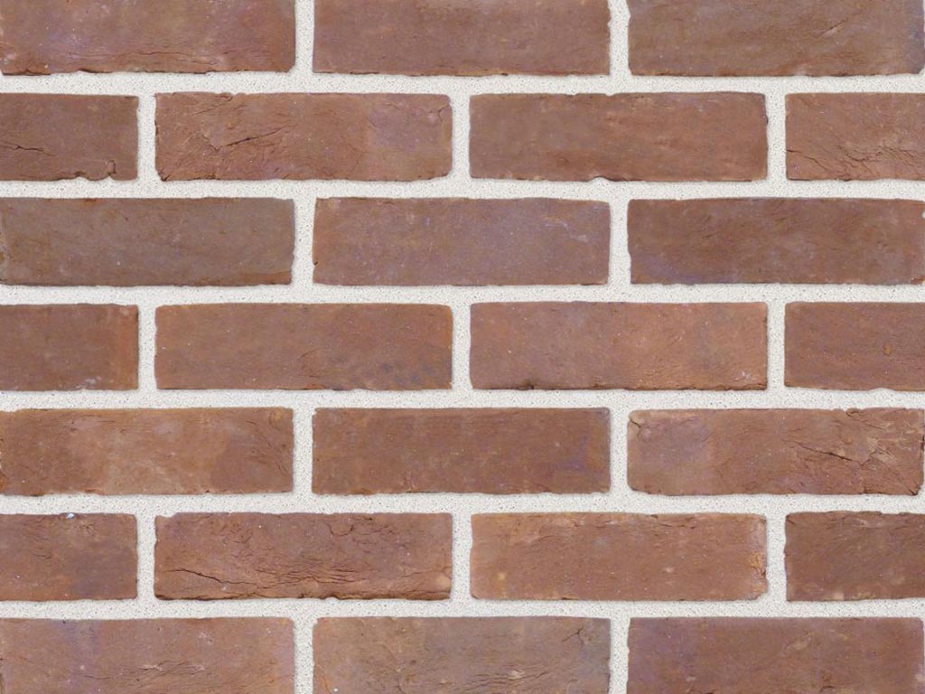 Close up of a wall of Tettenhall Red bricks