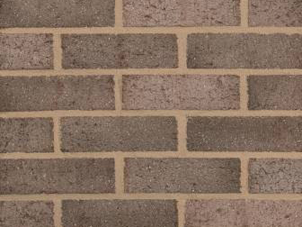 Close up of a wall of Greystone Multi bricks