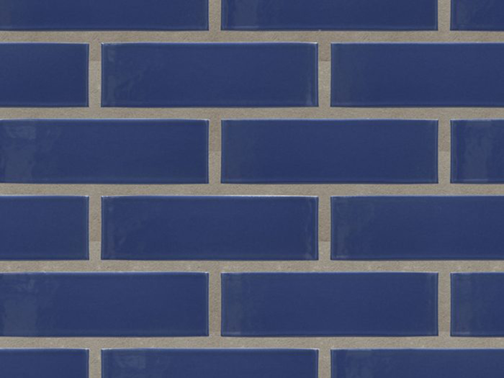 Close up of a wall of Athens Blue Glazed bricks