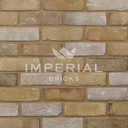 Close up of a wall of Reclamation Buff Handmade bricks