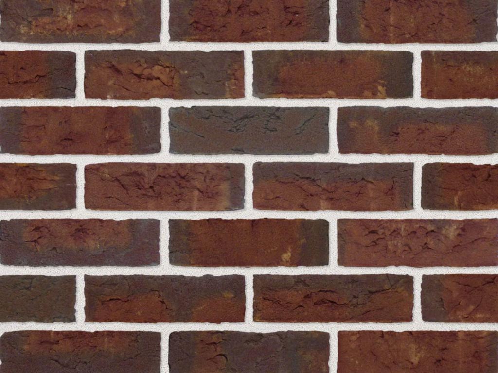 Close up of a wall of Monarch Red Multi Handmade bricks
