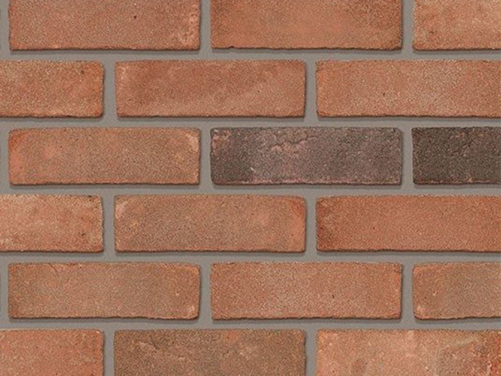 Close up of a wall of Ellington Red Multi bricks