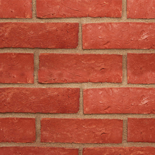 Close up of a wall of Plumstead Orange bricks
