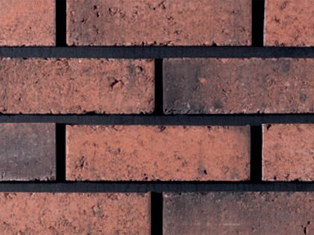 Close up of a wall of Clifton Ruby bricks