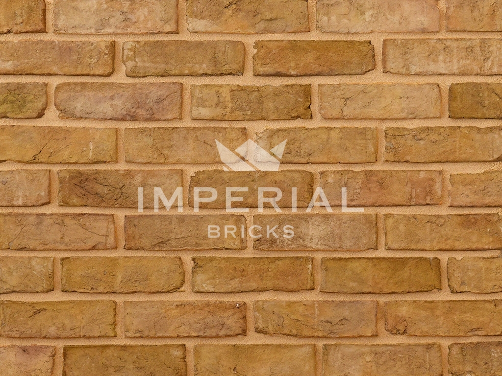 Close up of a wall of Windsor Yellow bricks