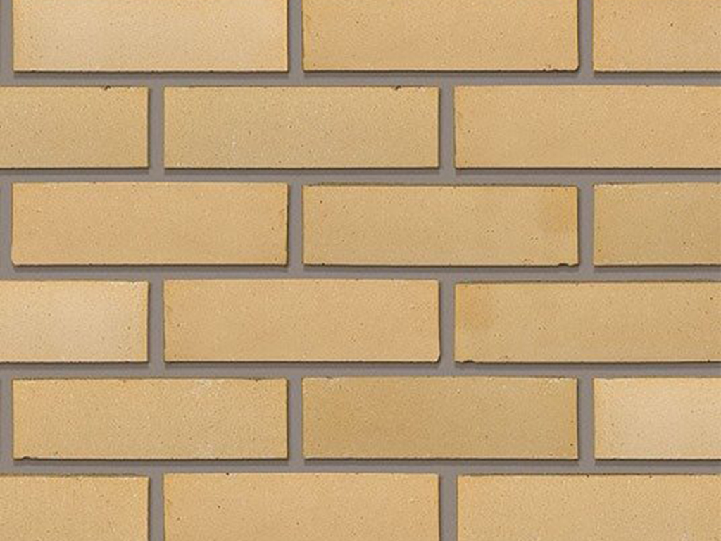 Close up of a wall of Staffordshire Smooth Cream bricks