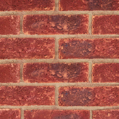 Close up of a wall of Draycott Red bricks