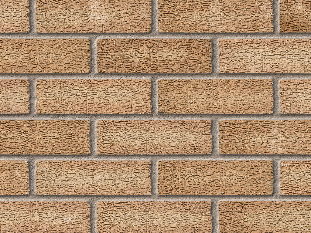 Close up of a wall of Anglian Beacon Sahara bricks