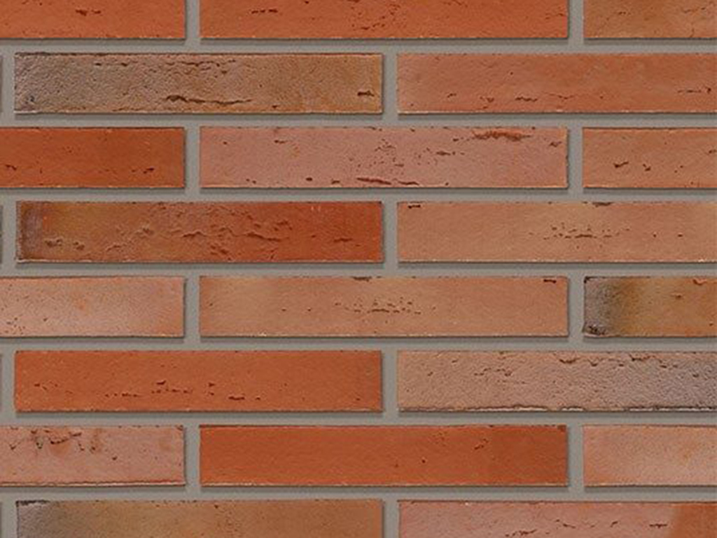 Close up of a wall of Megaline Dark Red Multi bricks