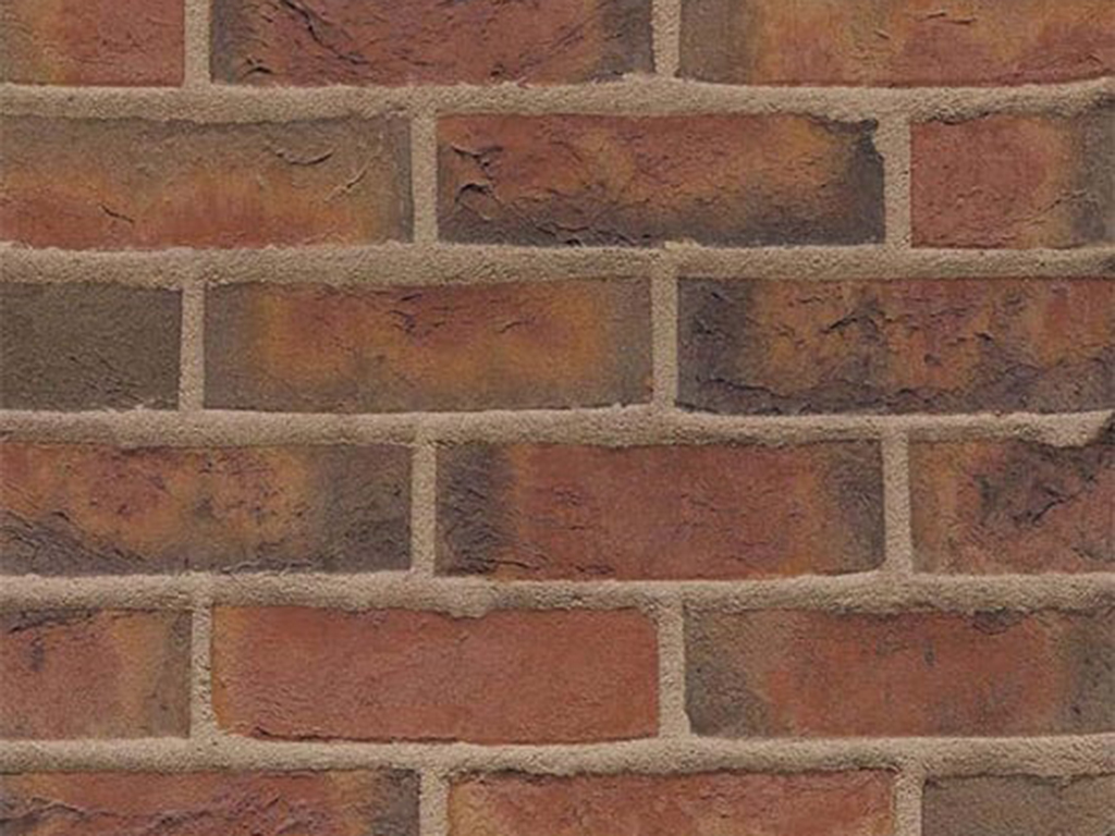 Close up of a wall of Kansas Red Multi bricks