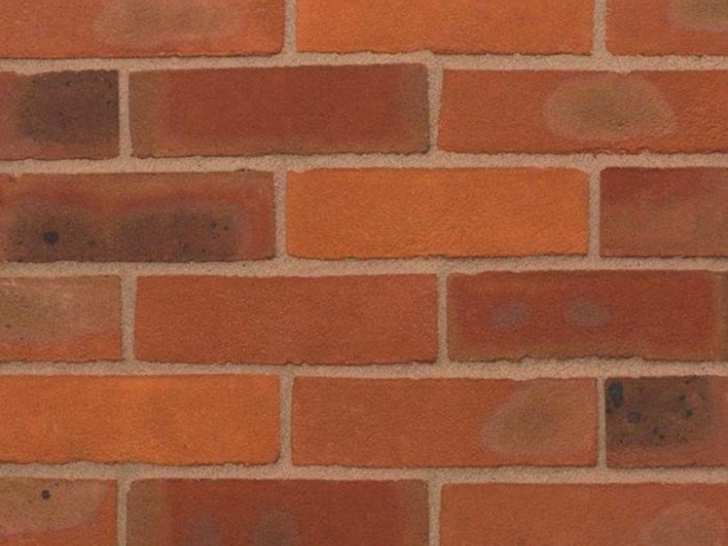 Close up of a wall of Cholesbury Light Red Multi bricks