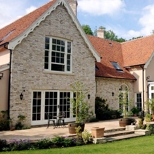An exterior of a house built using St Ives Cream Rustica bricks
