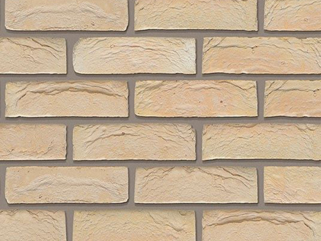 A wall of Andante Golden Buff bricks