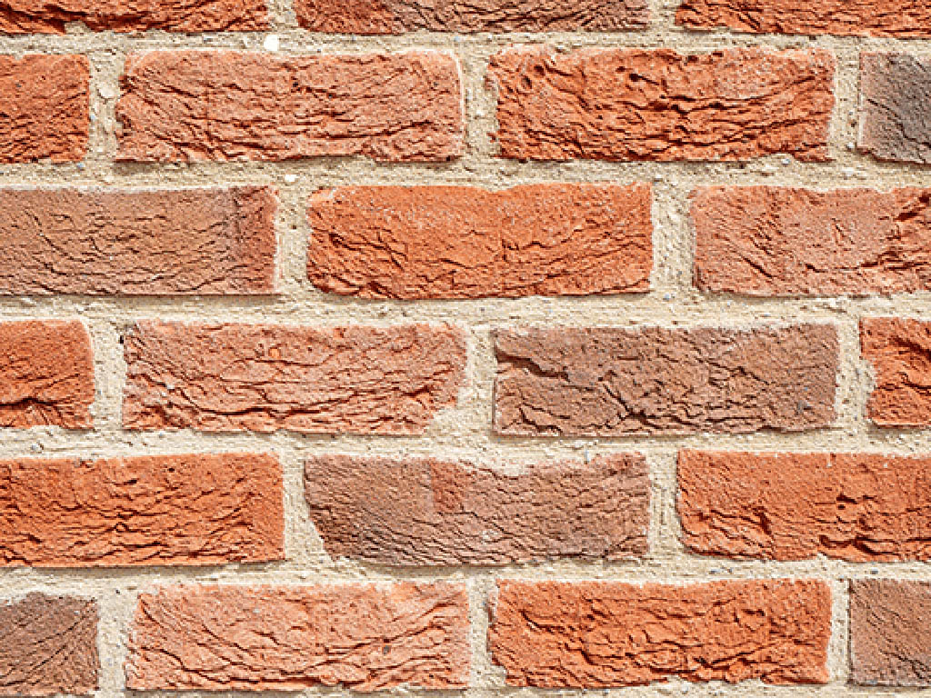 Close up of a wall of Old Clamp bricks