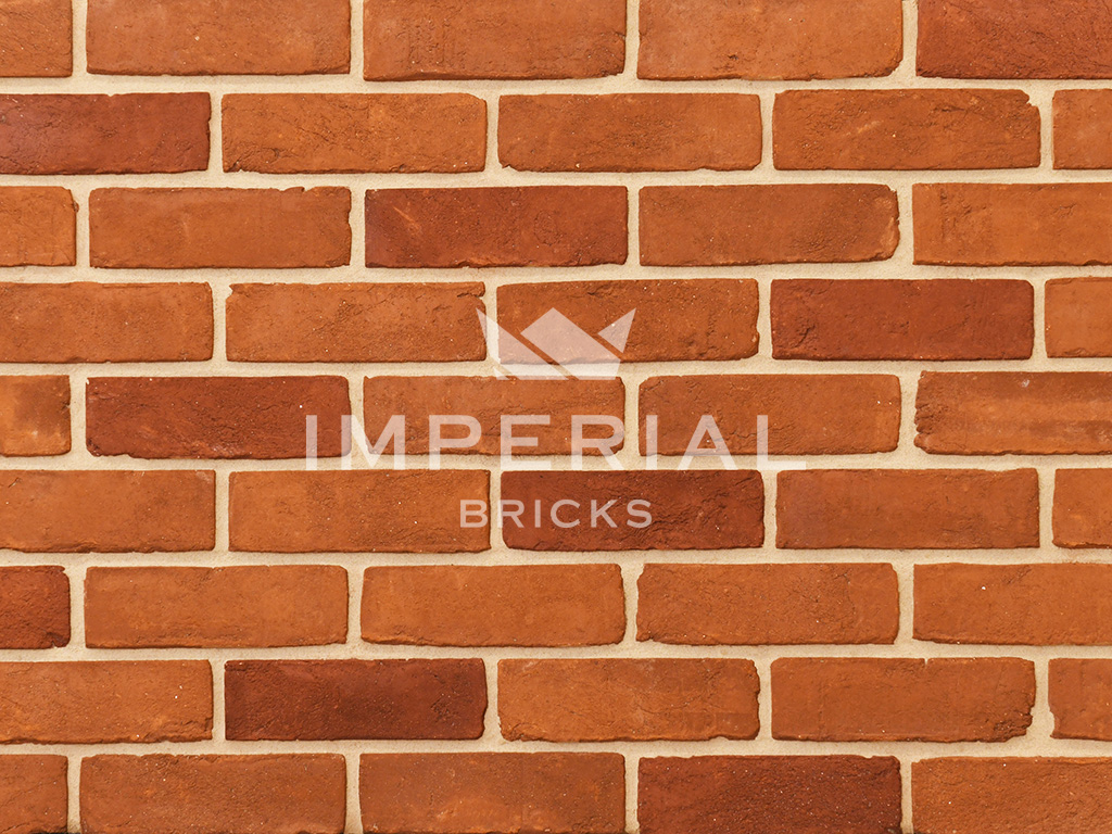 Close up of a wall of Regency Orange Multi bricks