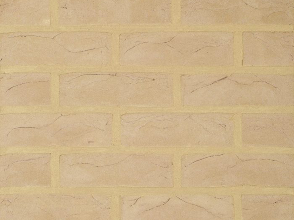 Close up of a wall of Bramshaw Buff bricks