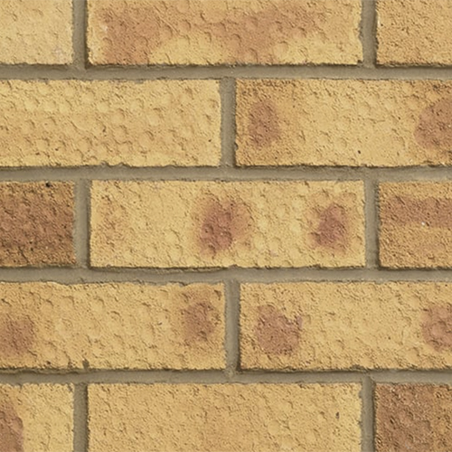 Close up of a wall of Saxon Gold London bricks
