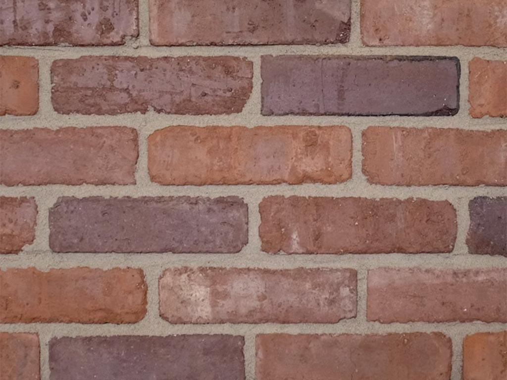 Close up of a wall of Clamp Natural Orange bricks