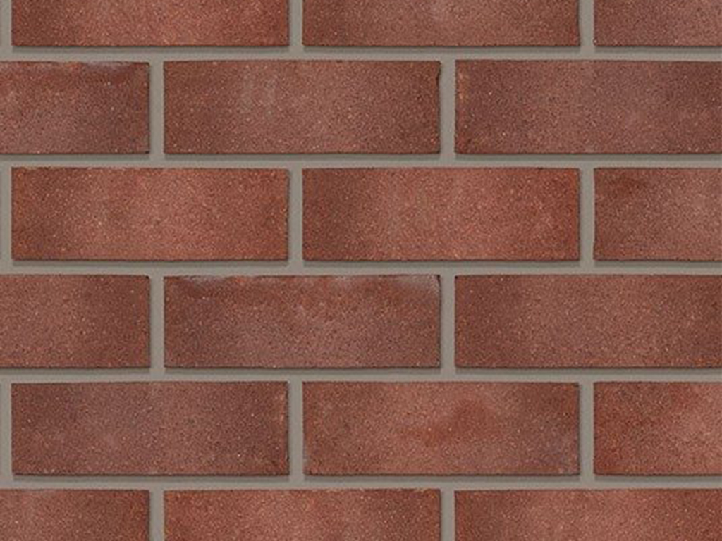 Close up of a wall of Swarland Purple Sandfaced 73mm bricks