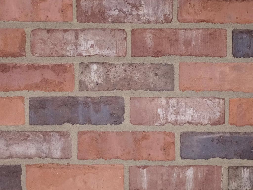 Close up of a wall of Clamp Russet White bricks