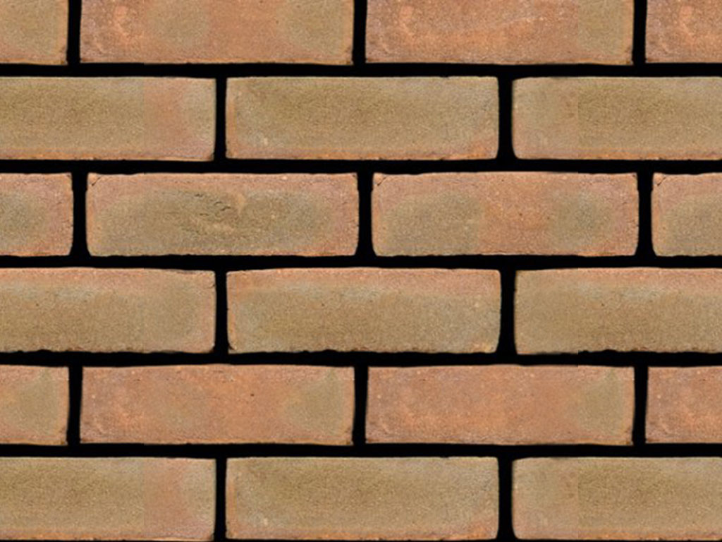 Close up of a wall of Breckland Autumn Stock bricks