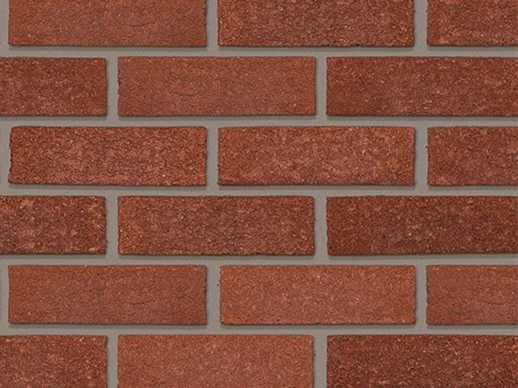 Close up of a wall of Peak Mixed Red bricks
