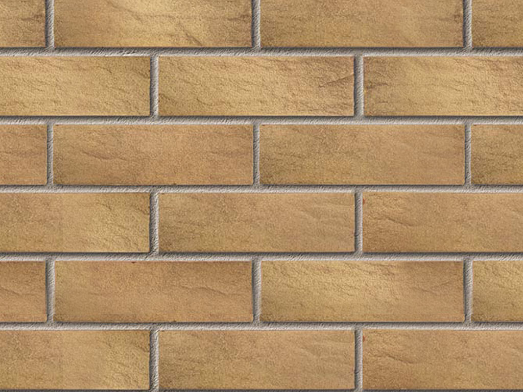 Close up of a wall of Aston Weathered Buff bricks