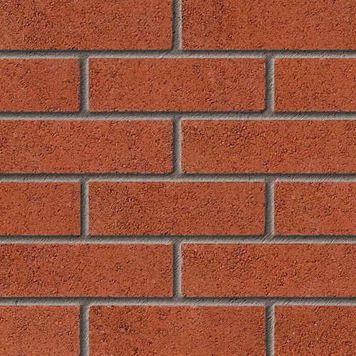 Close up of a wall of Frieston Red bricks