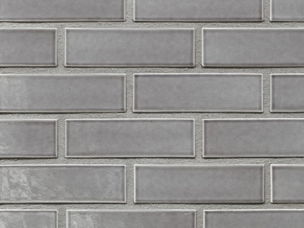 Close up of a wall of Akoya Grey Glazed bricks