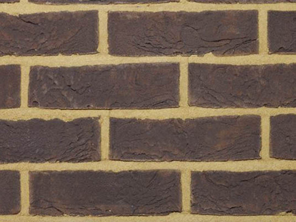 Close up of a wall of Forum Charcoal bricks