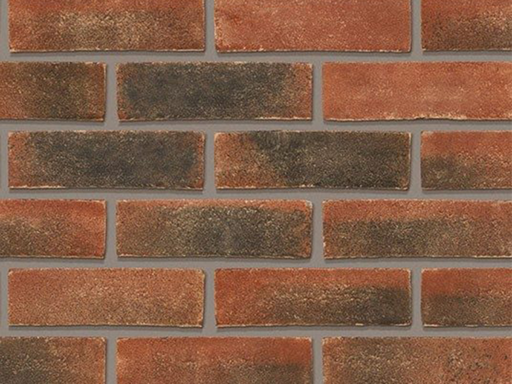 A wall of New Red Multi Gilt Stock bricks