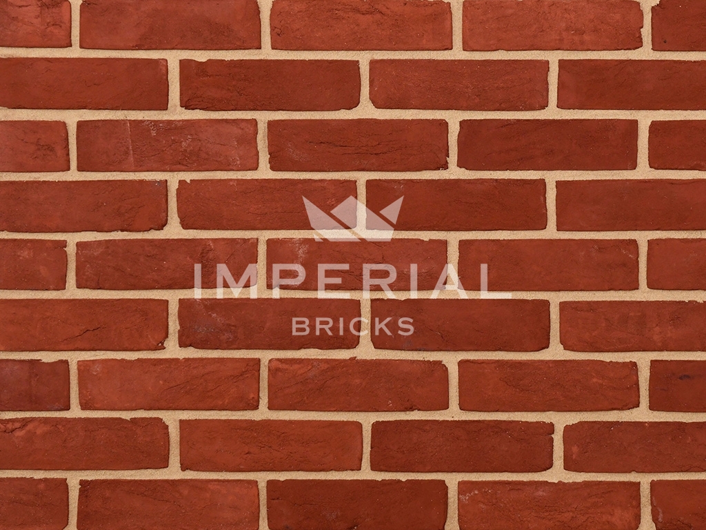 Close up of a wall of Red Rubber bricks