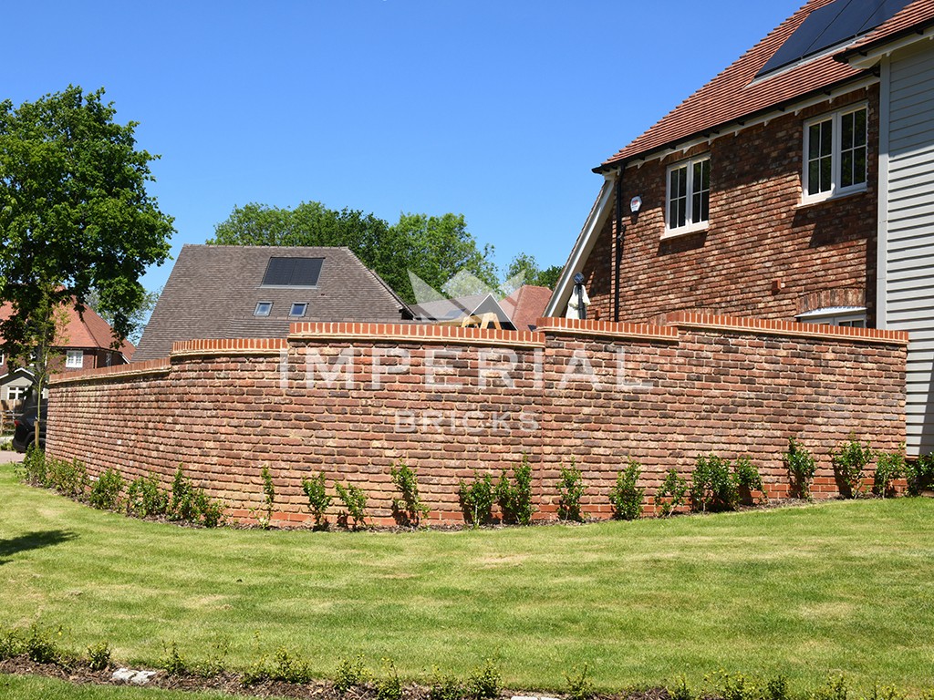 A boundary wall built using Tumbled Reclamation Red bricks
