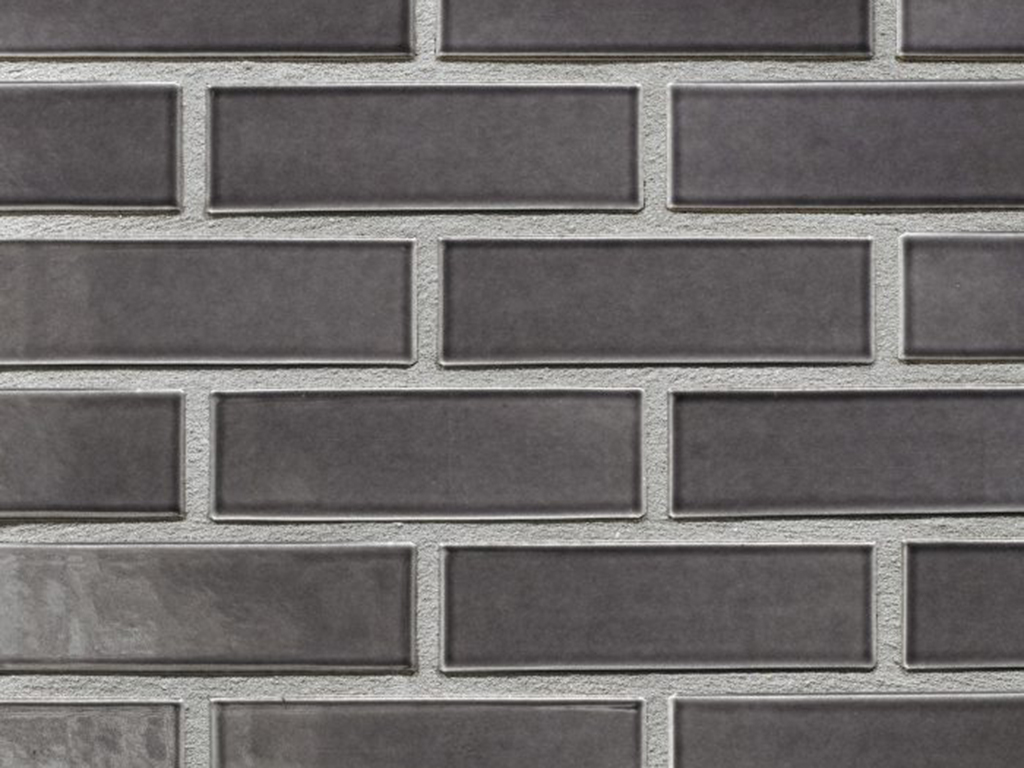 Close up of a wall of Sri Lanka Dark Grey Glazed bricks