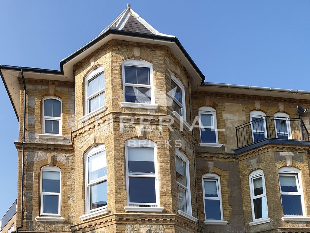 An exterior of a house built using Reclamation Cambridge Buff bricks