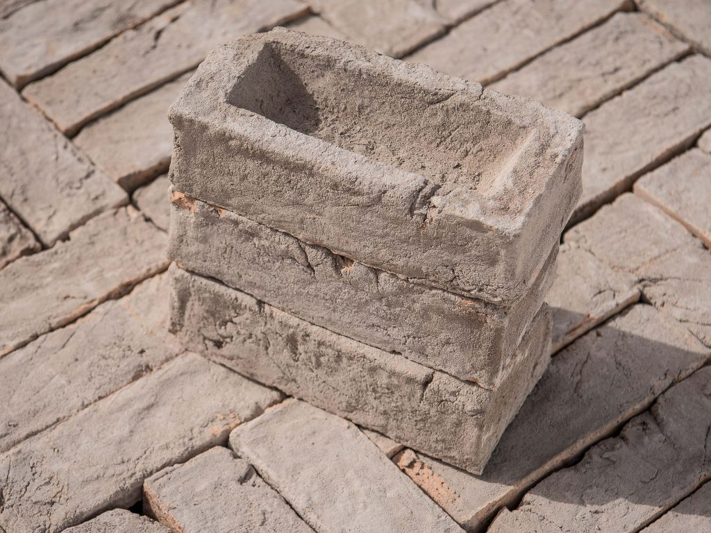 A stack of Hurlingham Grey Handmade bricks
