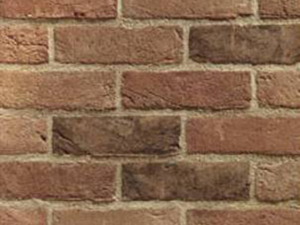 Close up of a wall of Heritage Olde English Mixture bricks