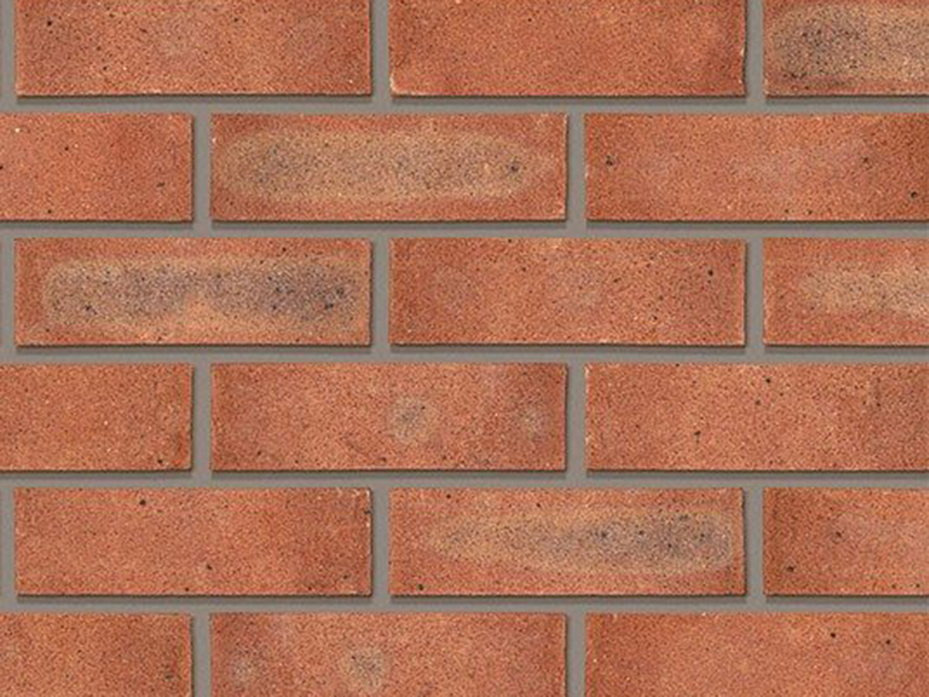 Close up of a wall of Caldera Red Multi bricks