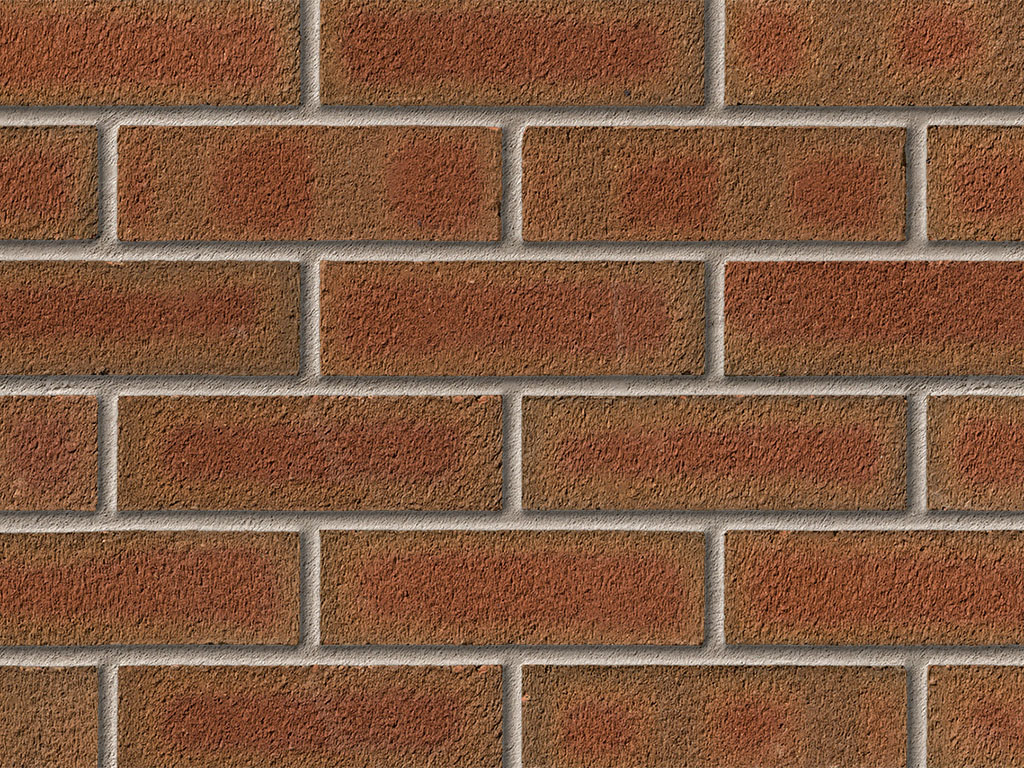 Close up of a wall of Alderley Mixture bricks