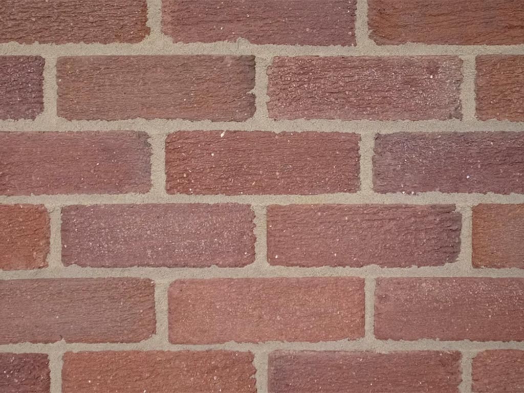 Close up of a wall of Skiddaw bricks