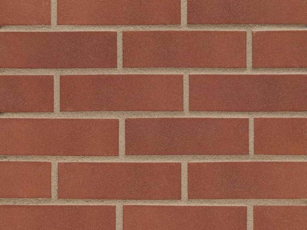 Close up of a wall of Sandown Red bricks